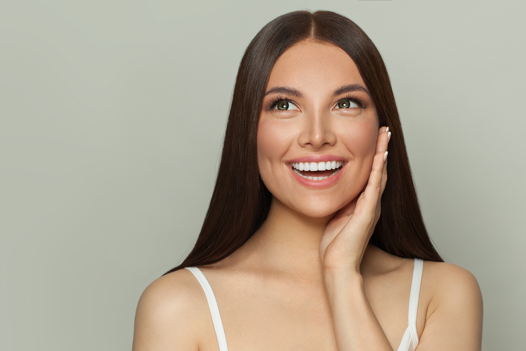 Happy Surprised Woman With Clear Skin And Long Healthy Straight Hair | Walnut Creek Aesthetics in Walnut Creek, CA